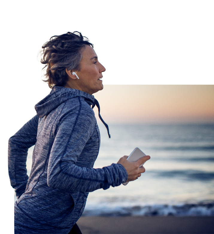 Woman running on the shore